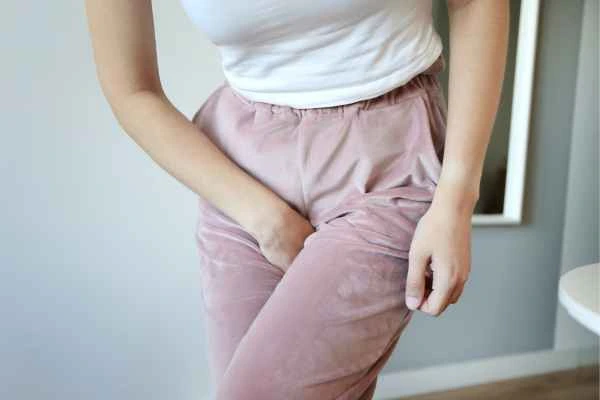 woman running for the toilet because of urinary incontinence Sedgley Park